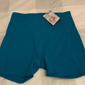 Baleaf Teal High-Rise Bike Shorts with 2 deep Side Pockets.